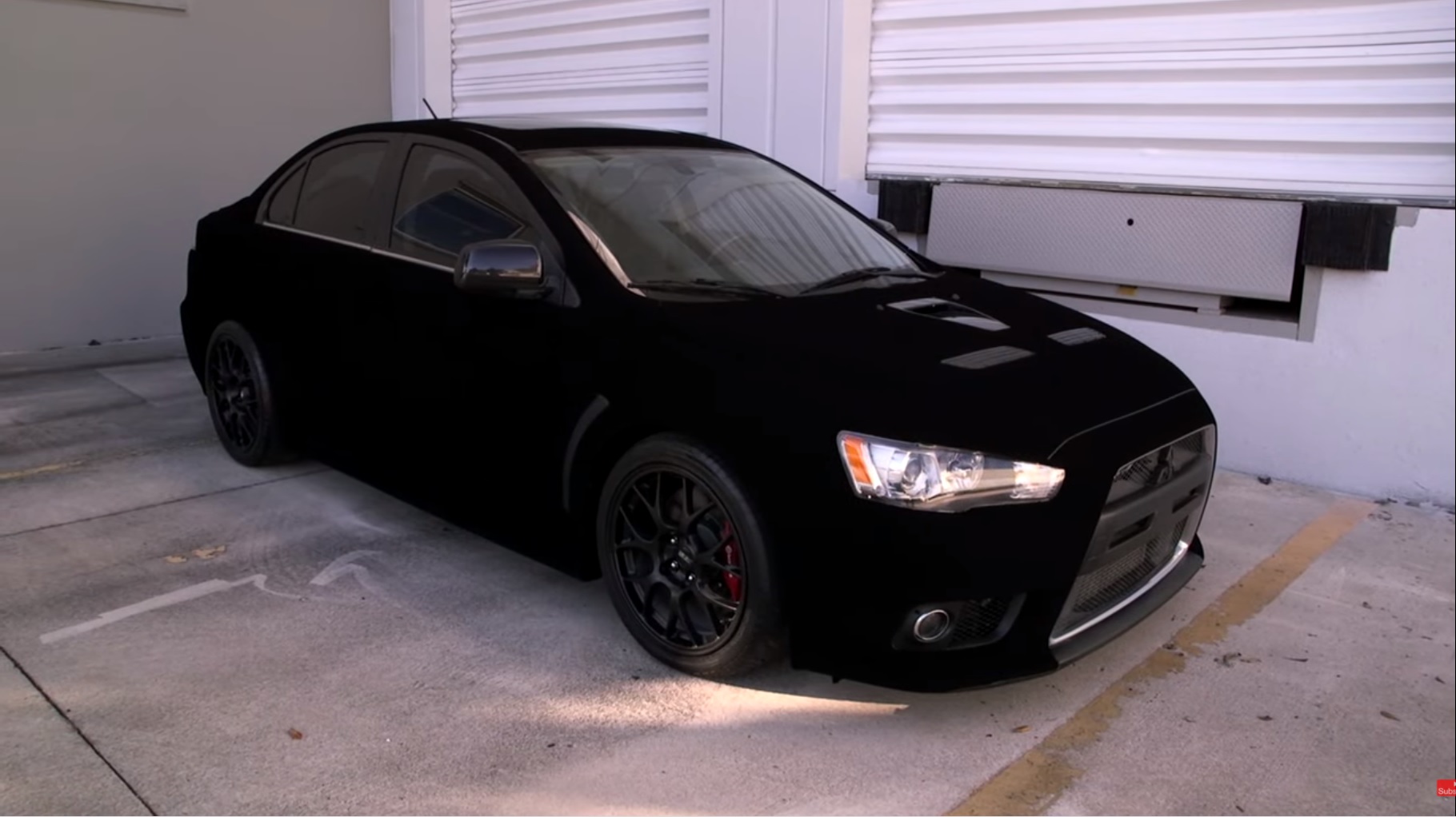 czarne mitsubishi lancer