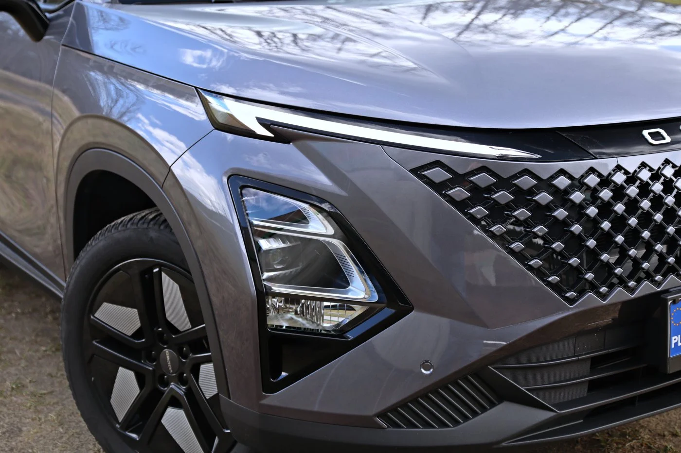 https://cdn-ab.spidersweb.pl/2026/10/omoda-5-hybrid-test-detal1.jpg